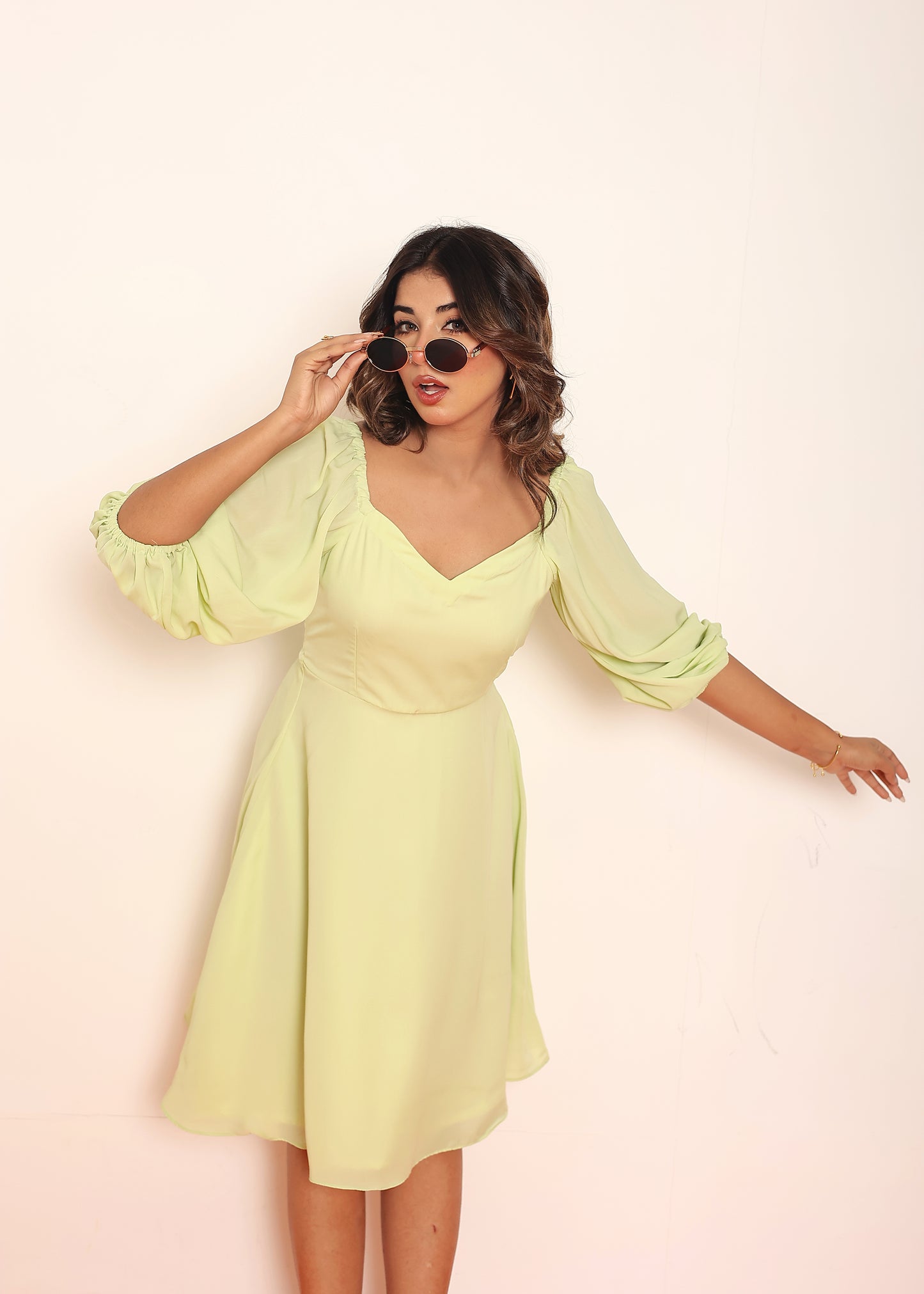 Mini lime green dress with puff sleeves