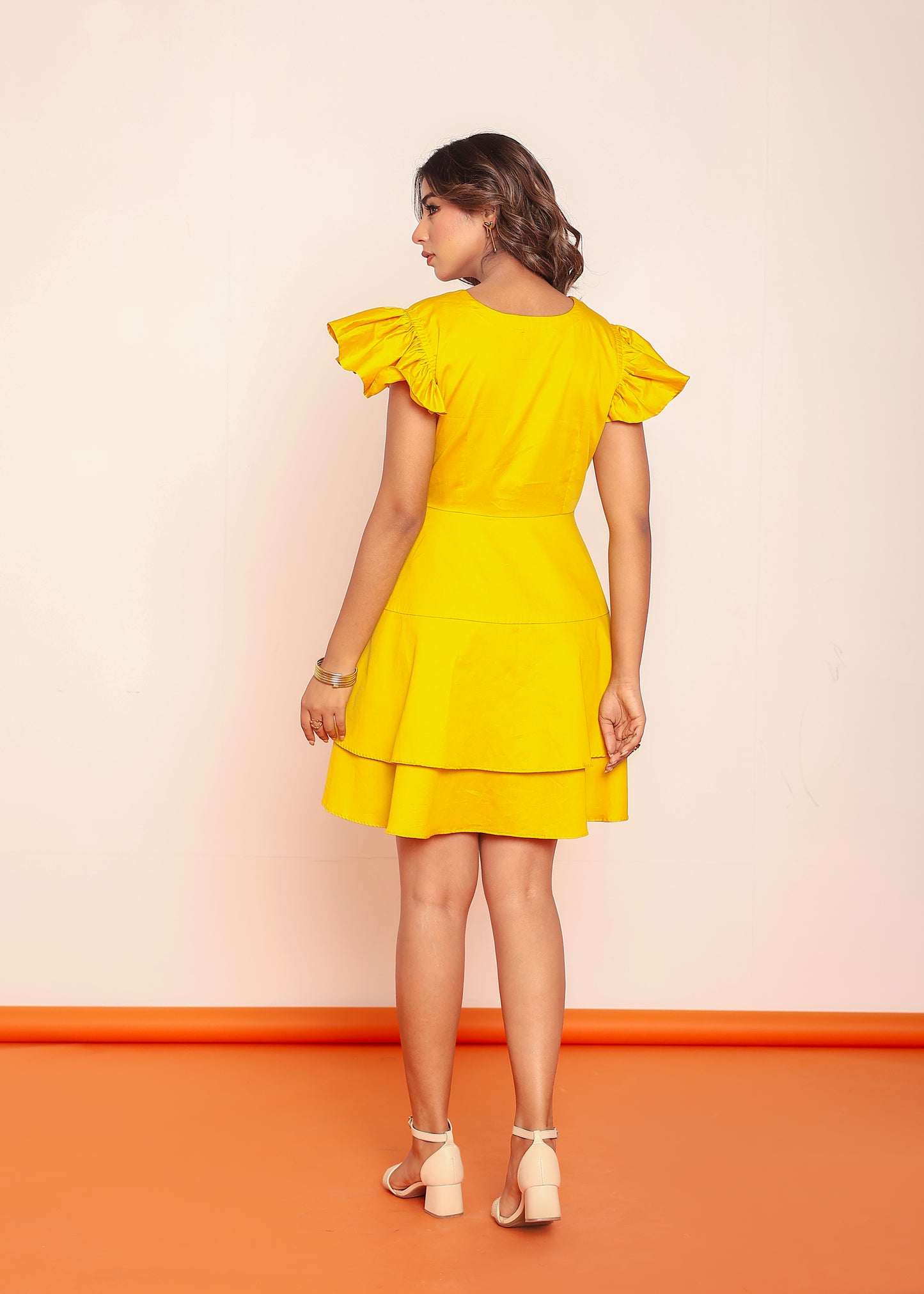 Solid tiered mini dress