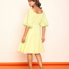 Mini lime green dress with puff sleeves