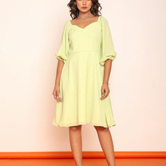Mini lime green dress with puff sleeves