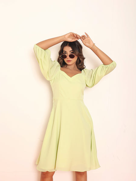 Mini lime green dress with puff sleeves