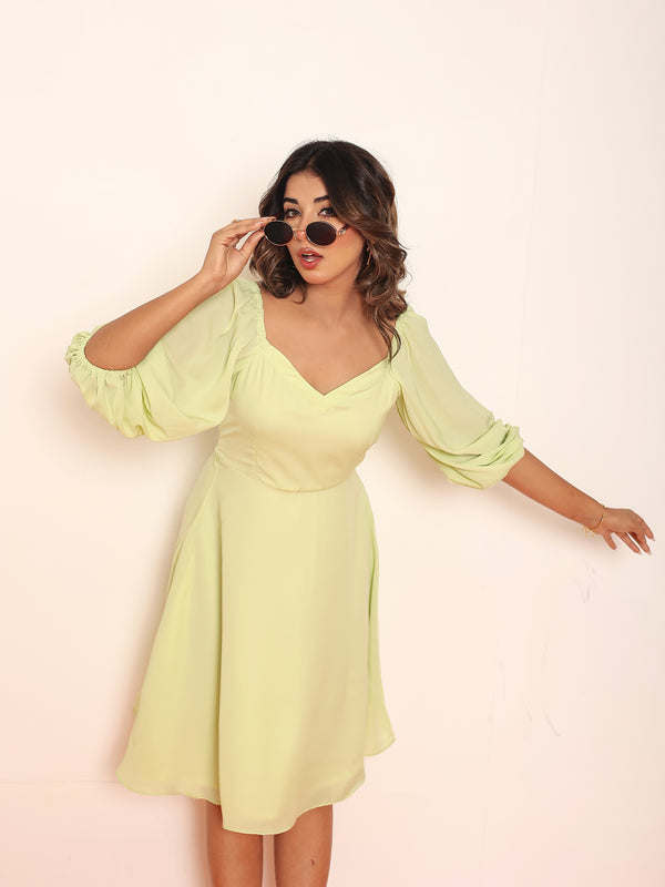Mini lime green dress with puff sleeves