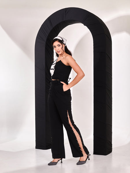Black top with straight rhinestone pant