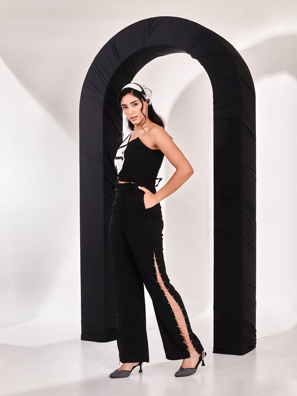Black top with straight rhinestone pant