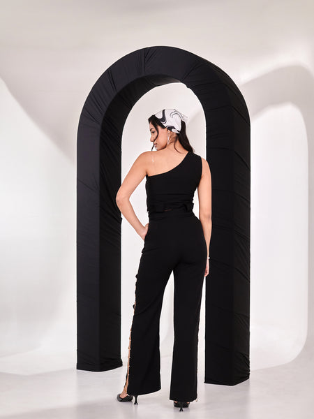 Black top with straight rhinestone pant