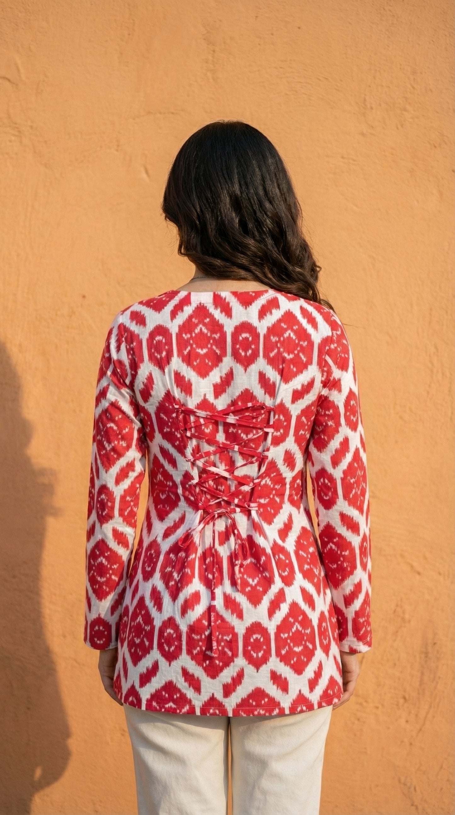 Women Red Ikkat Printed Cotton Full Sleeve Kurti with Lace-Up Back